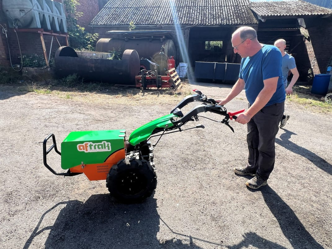 Handing over an AFT-e1 in a farmyard